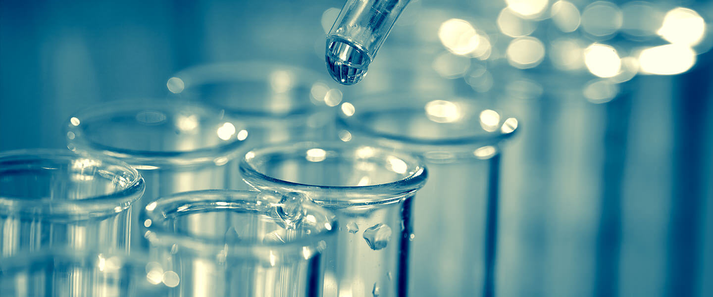 Water drops in a transparent glass material in a chemical laboratory